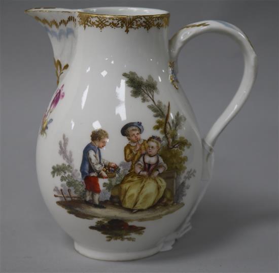 A Meissen baluster cream jug, painted with children at play, height 13.5cm